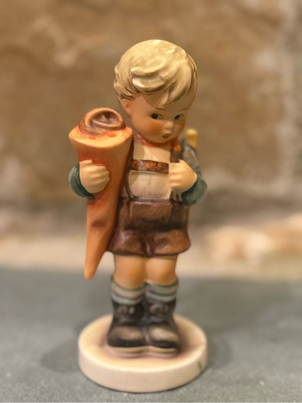 Hummel Blonde Boy Figurine with Brown Outfit and Orange Cone